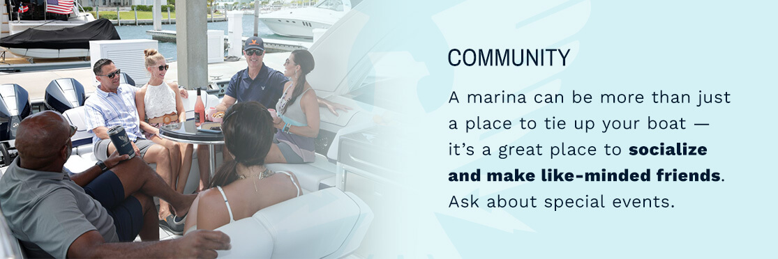 Social gathering on a boat docked in a marina.