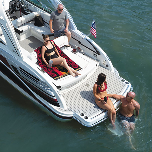 People lounging on boat aft