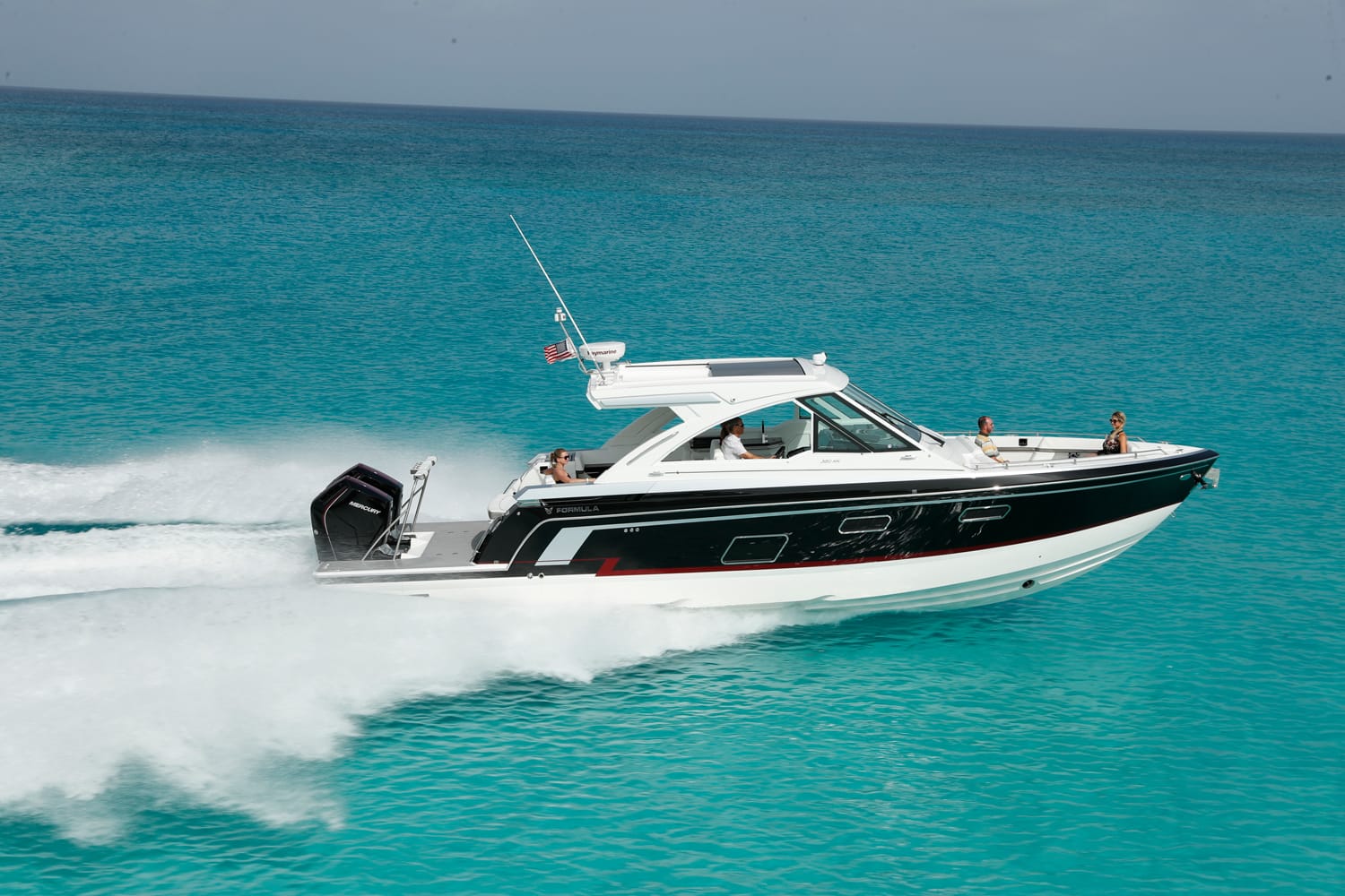 side angle of boat cruising in water 380 Super Sport Crossover Formula Boat