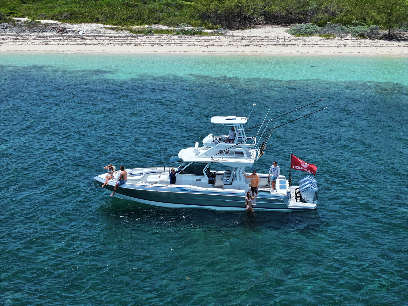 center console fishing boat on the water at sunset
